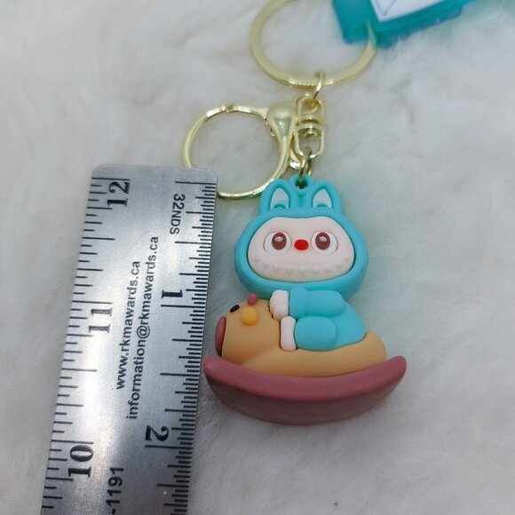 2/$25 Labubu rocking horse blue keychain with strap that reads "Boom!" - Picture 4 of 6
